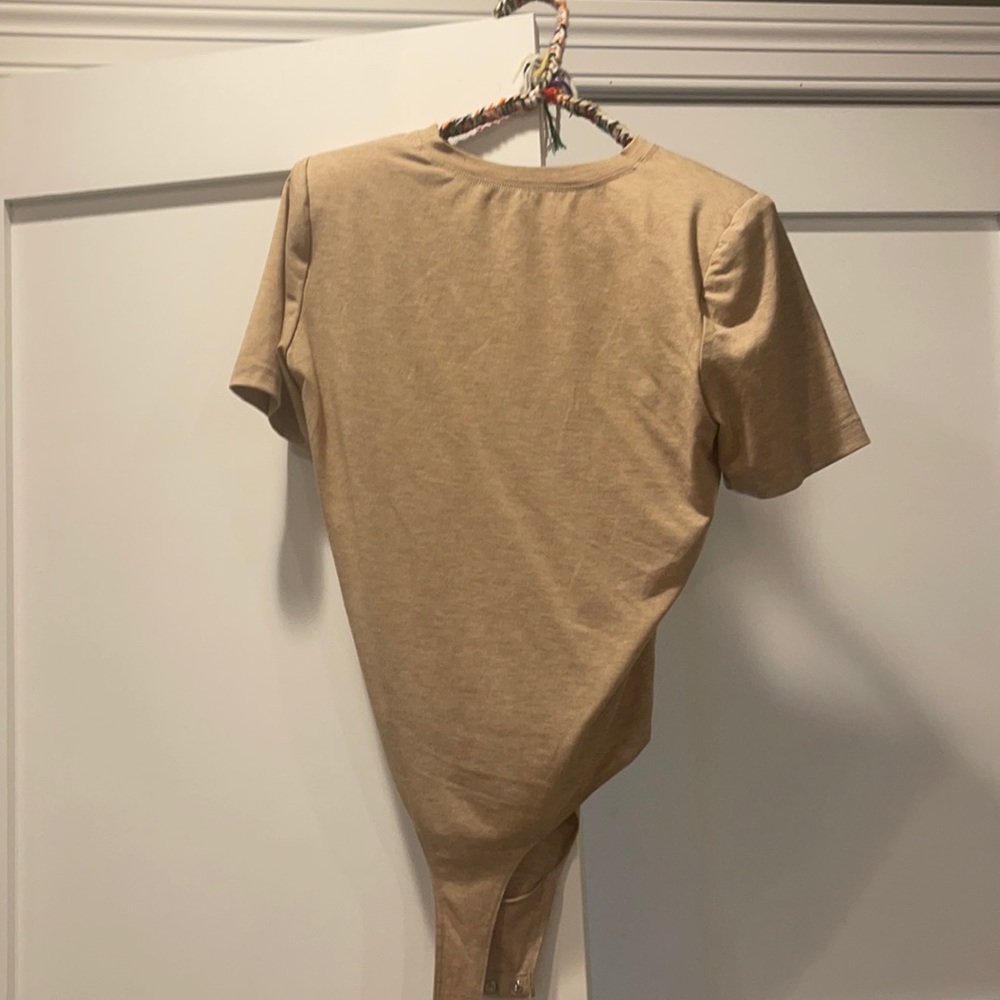 Bodysuit brand new with tags.